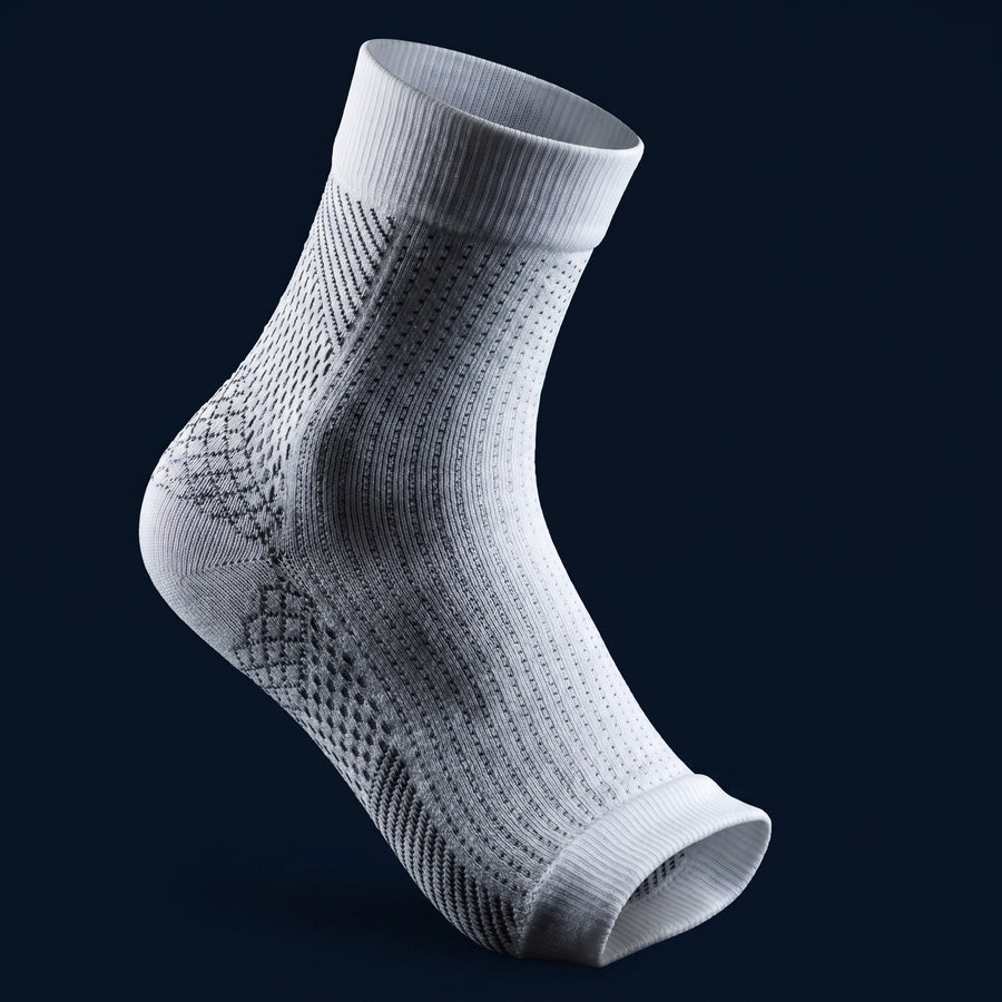 KANEEA compression sleeve close-up showing mesh compression zones
