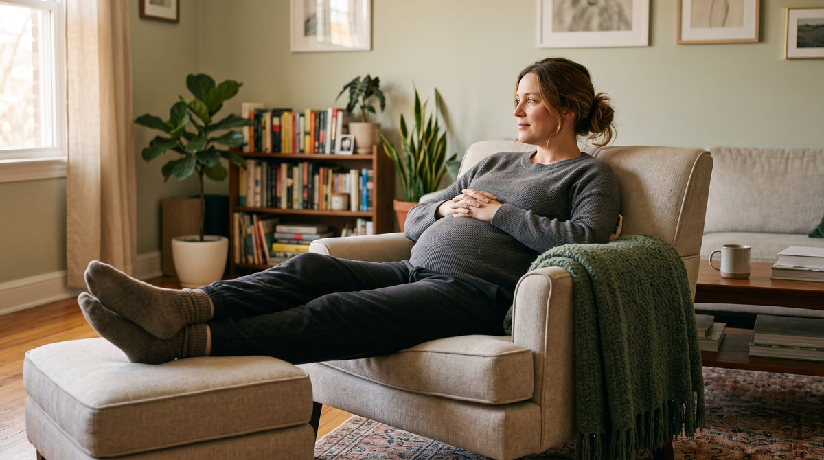 Pregnant woman resting in a chair with her feet up
