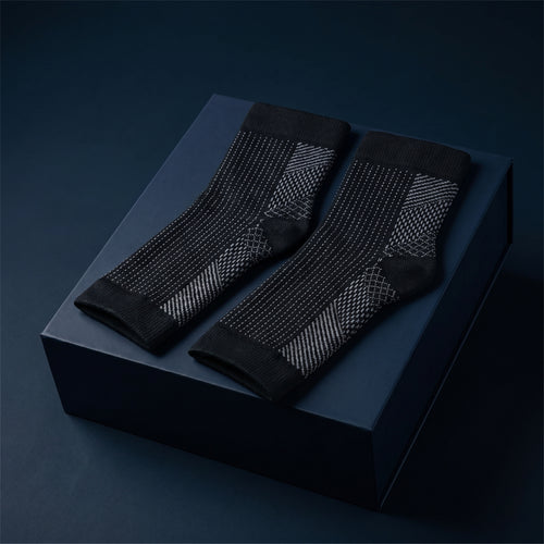 KANEEA black toeless compression ankle sleeves on navy box