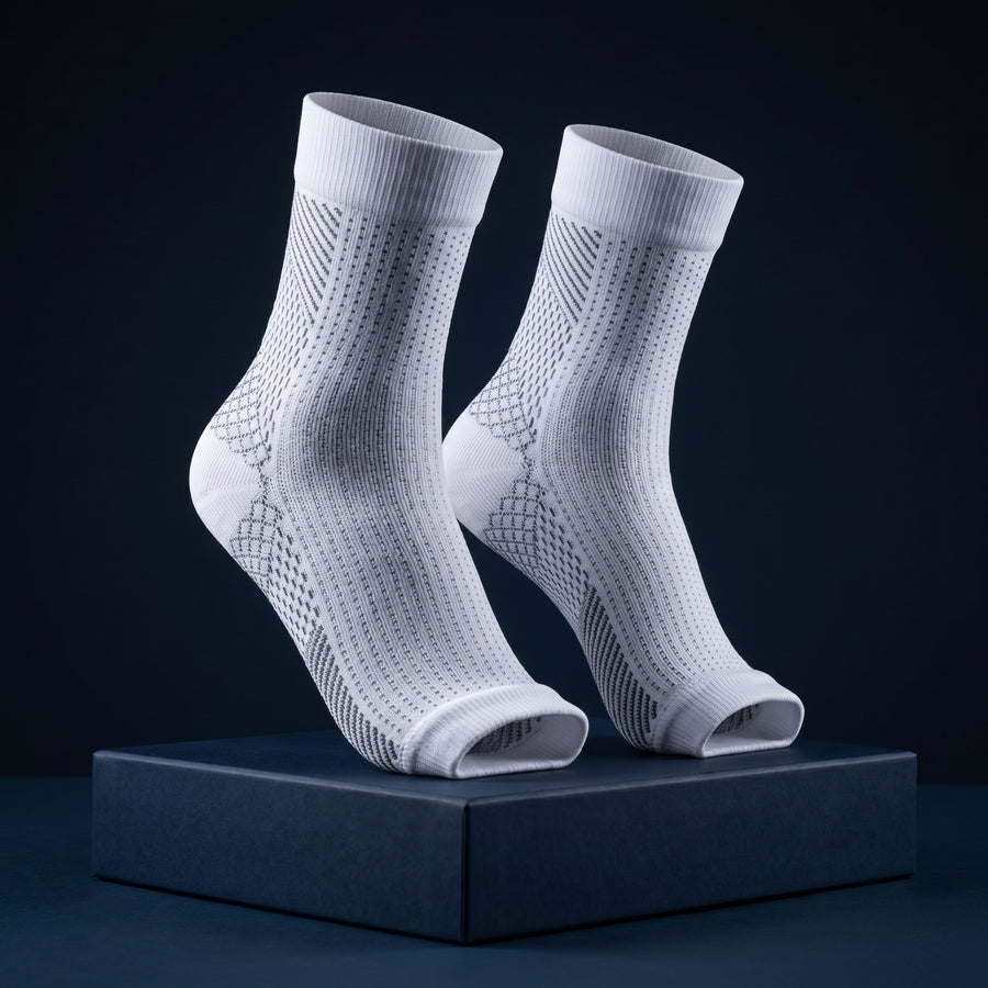 KANEEA compression ankle sleeves pair standing on navy box